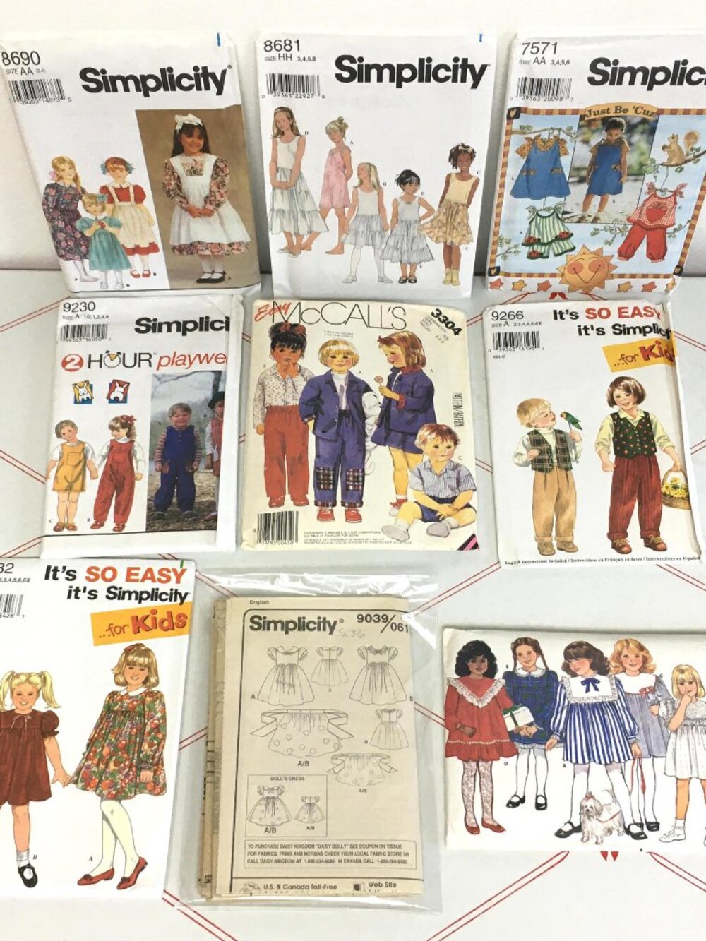 Lot #11 - Collection of 9 Children's Sewing Patterns - Sizes 1-6